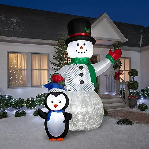 https://m.standardconcessionsupply.com/i/2023%20Images/Snowman_and_Penguin_kaleidoscope_Christmas_inflata.jpg